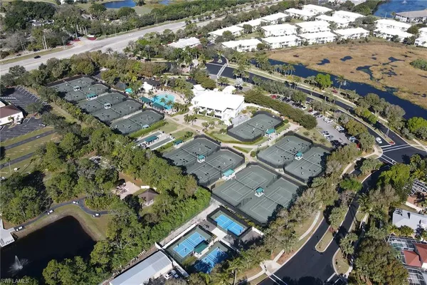 a view of outdoor space with signage and flags