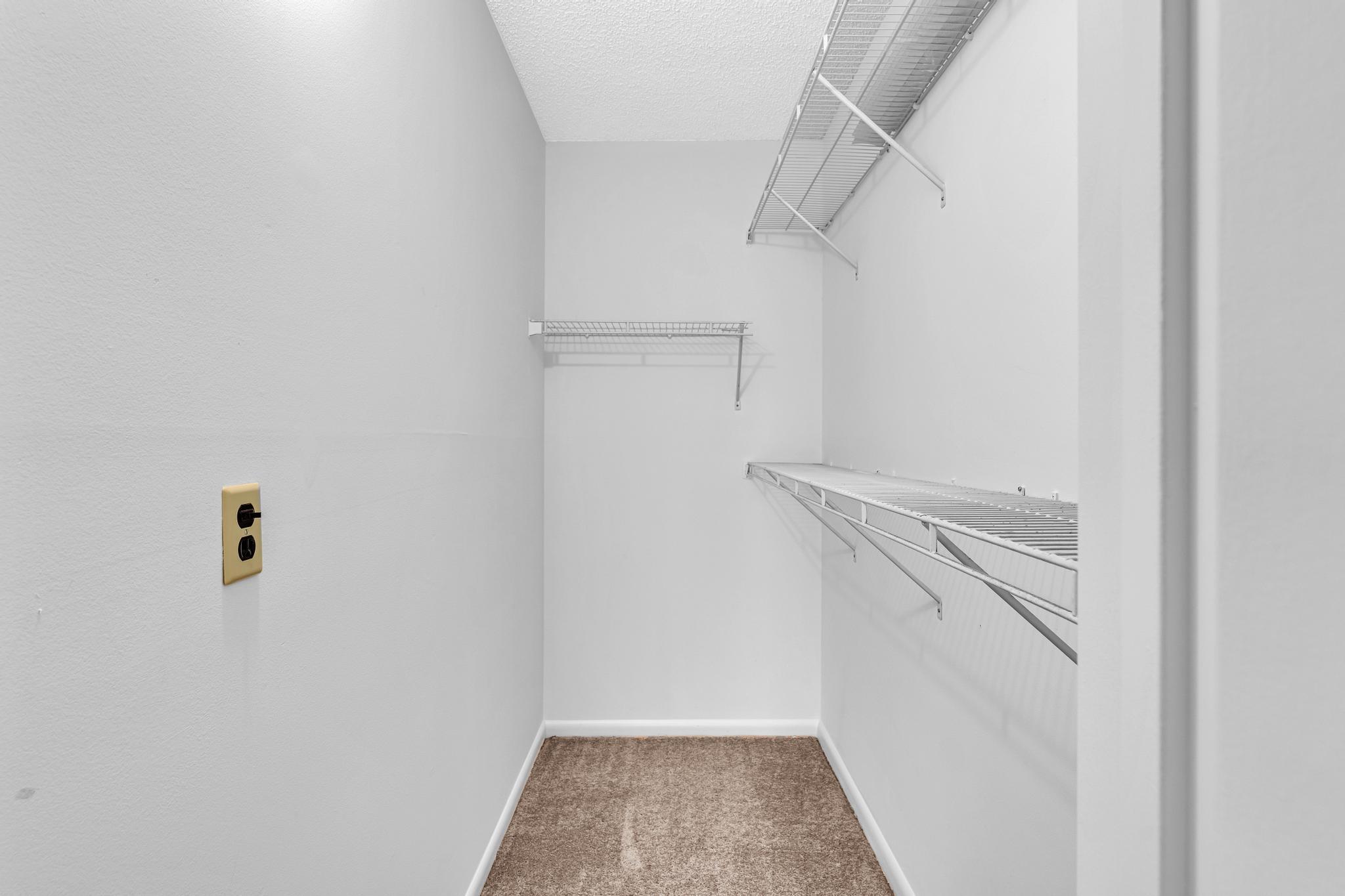 2066 Exeter Boca Raton, FL 33434 - Photo 26 of 60 a view of walk in closet with empty racks