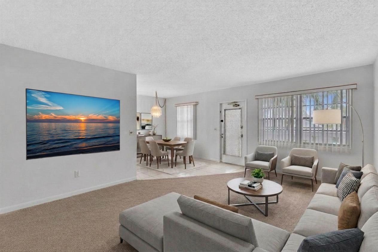 2066 Exeter Boca Raton, FL 33434 - Photo 5 of 60 a living room with furniture and a flat screen tv