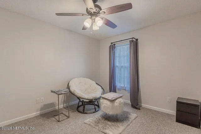 a view of livingroom with furniture