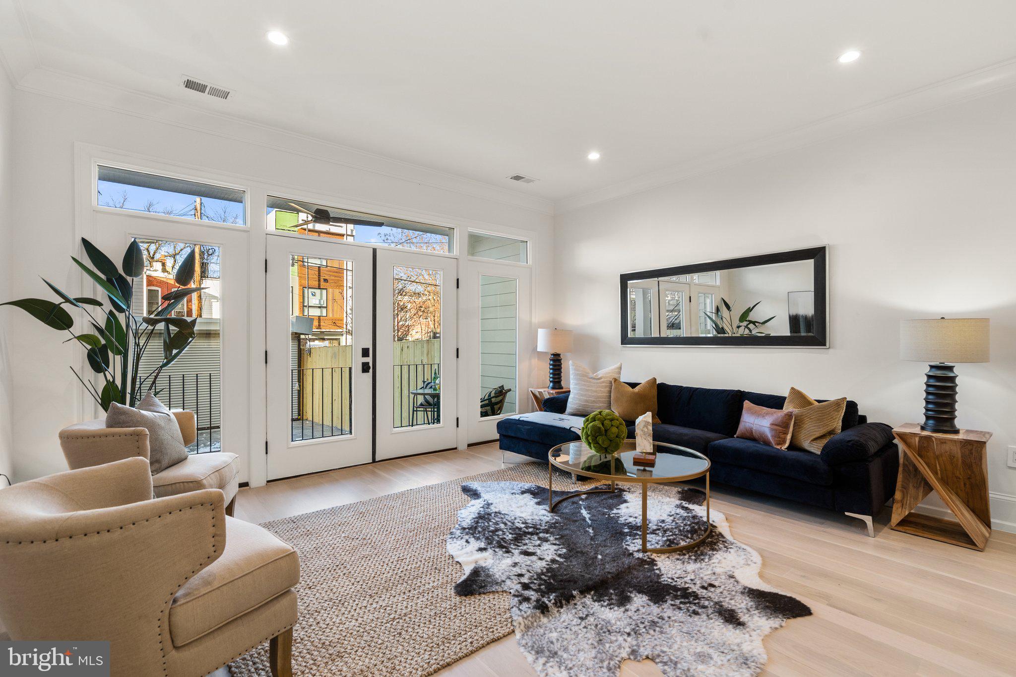 634 F Street Northeast Washington, DC 20002 - Photo 16 of 57 a living room with furniture or couch and a potted plant