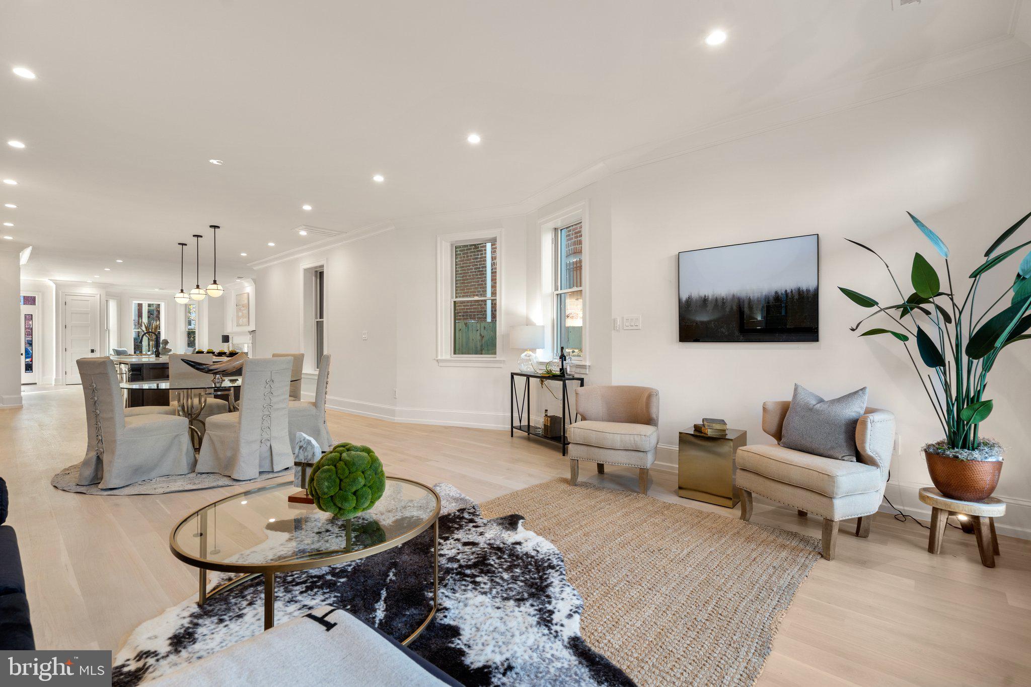 634 F Street Northeast Washington, DC 20002 - Photo 18 of 57 a living room with furniture and a flat screen tv