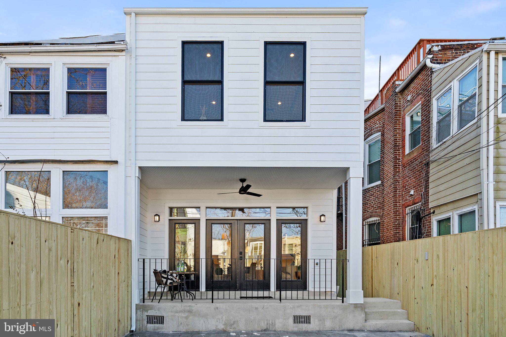634 F Street Northeast Washington, DC 20002 - Photo 21 of 57 a front view of a building with a glass door