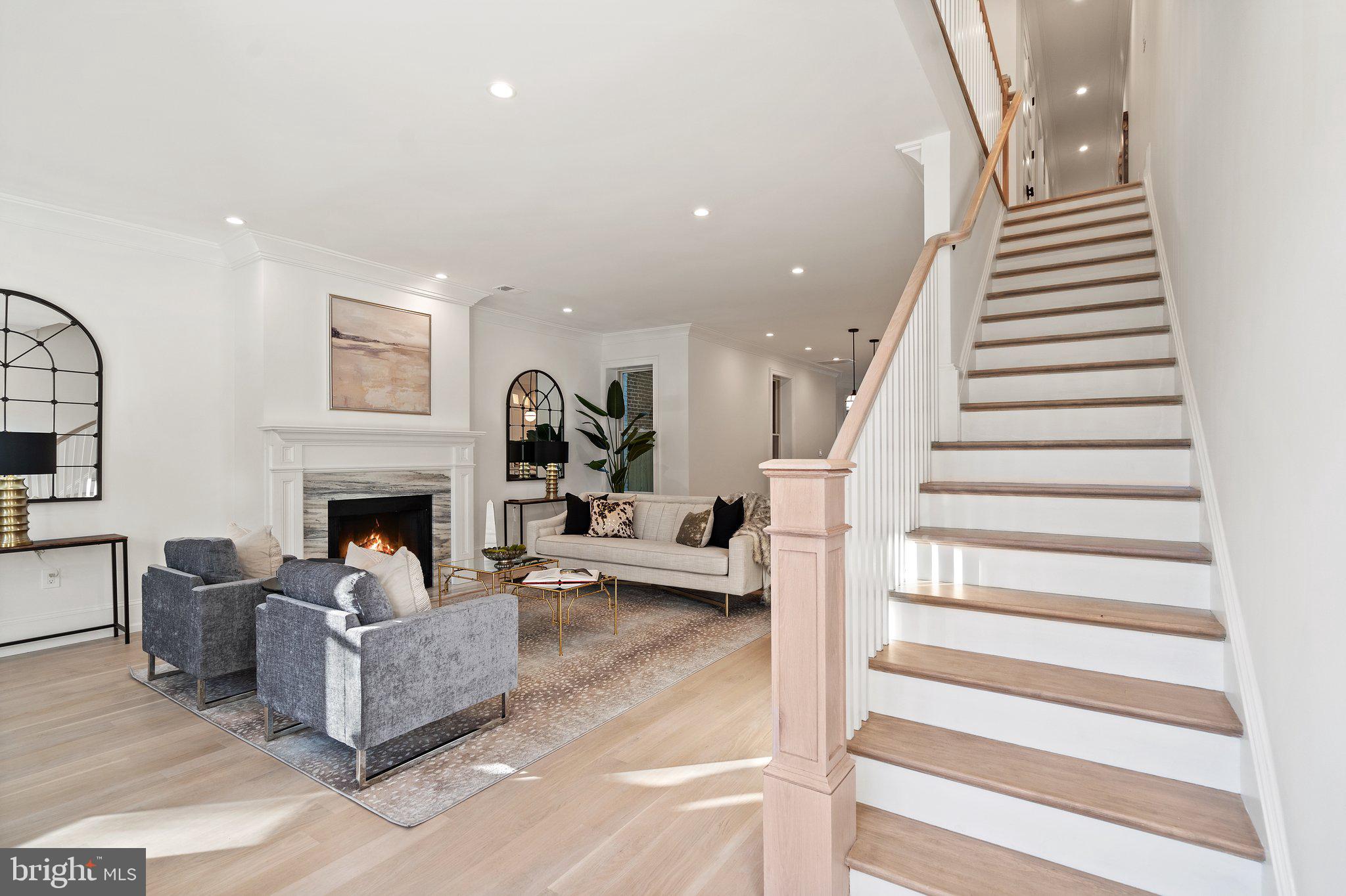 634 F Street Northeast Washington, DC 20002 - Photo 23 of 57 a living room with furniture and a fireplace