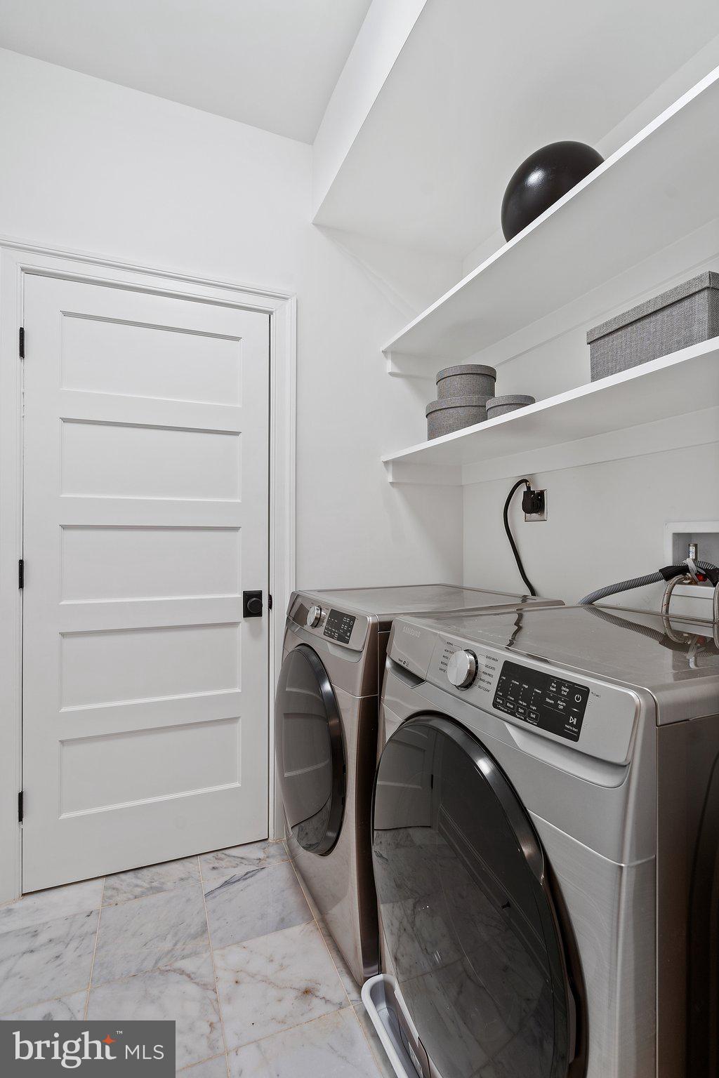 634 F Street Northeast Washington, DC 20002 - Photo 36 of 57 a utility room with dryer and washer