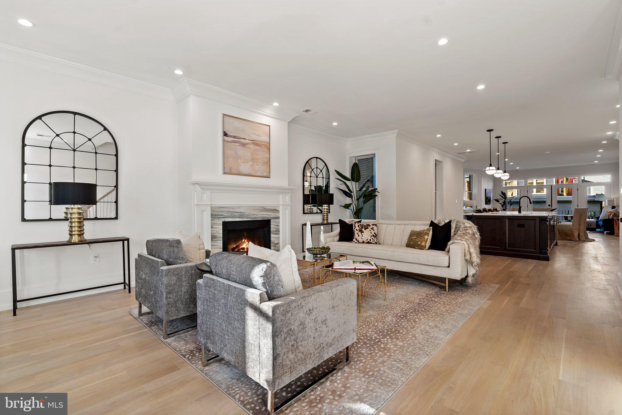 634 F Street Northeast Washington, DC 20002 - Photo 5 of 57 a living room with furniture and a flat screen tv