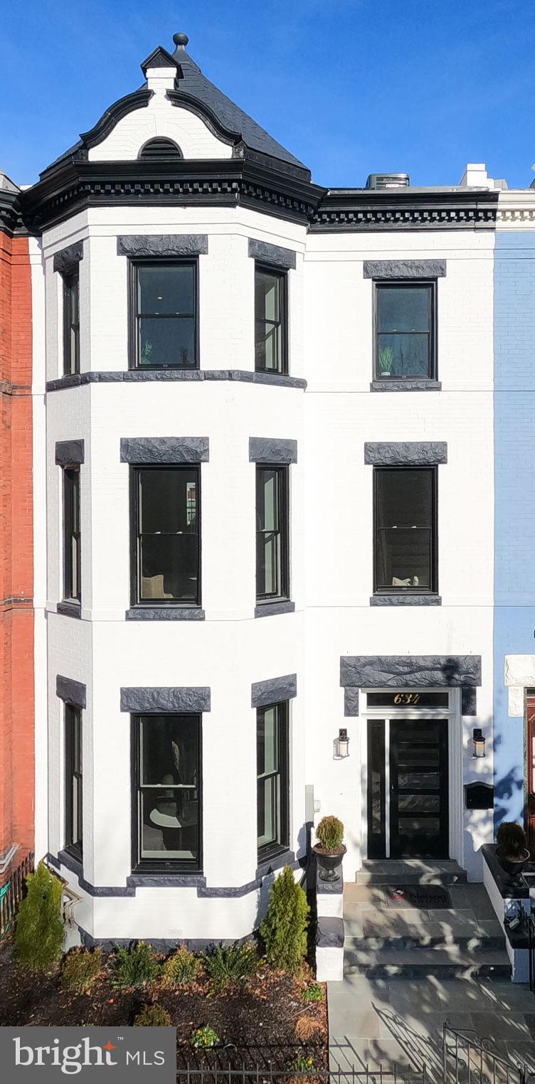 634 F Street Northeast Washington, DC 20002 - Photo 56 of 57 a front view of a house with a yard