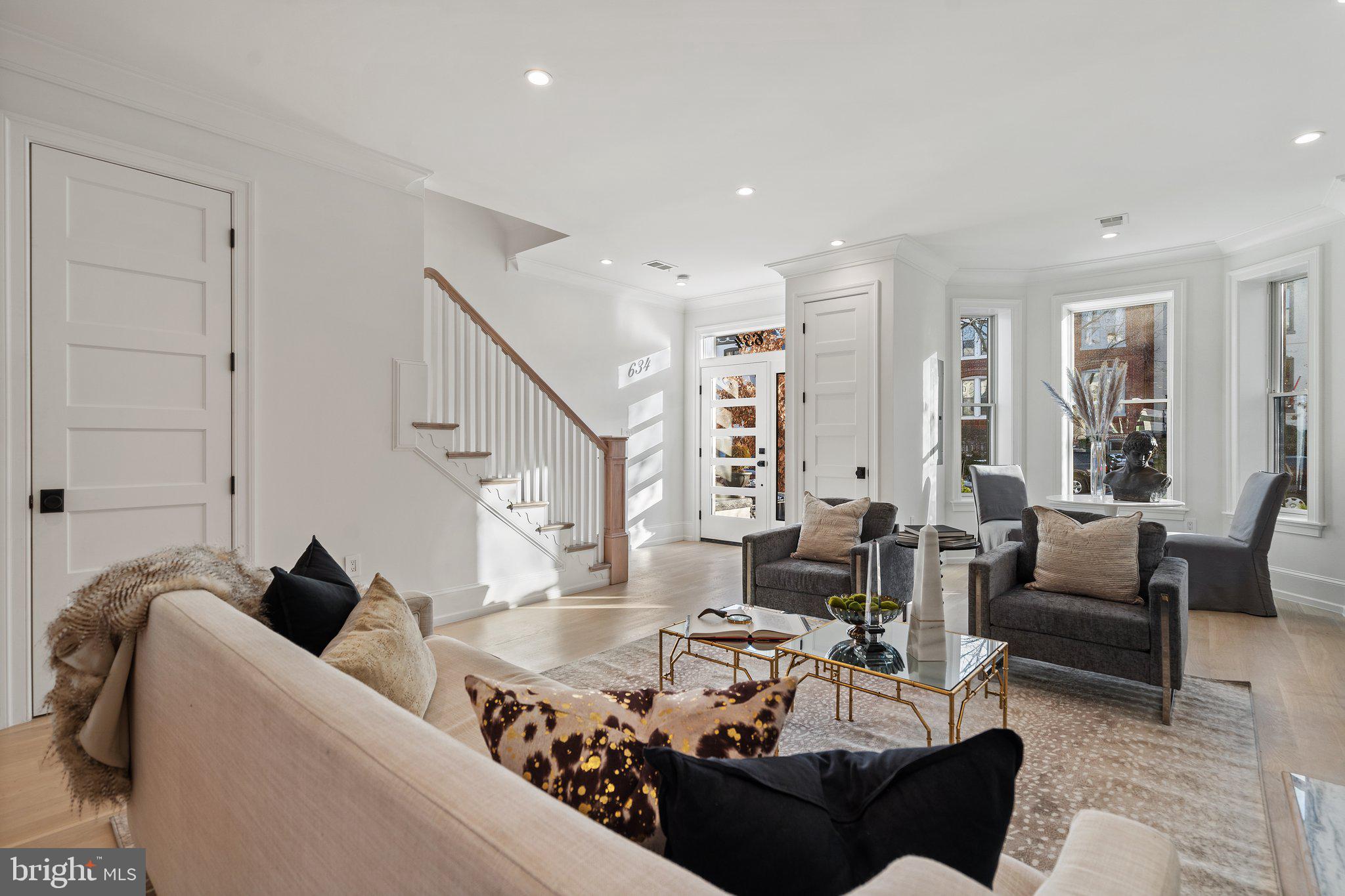 634 F Street Northeast Washington, DC 20002 - Photo 7 of 57 a living room with furniture or couch and a potted plant