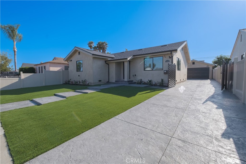 223 South Aprilia Avenue Compton, CA 90220 - Photo 45 of 46 a view of a house with a yard