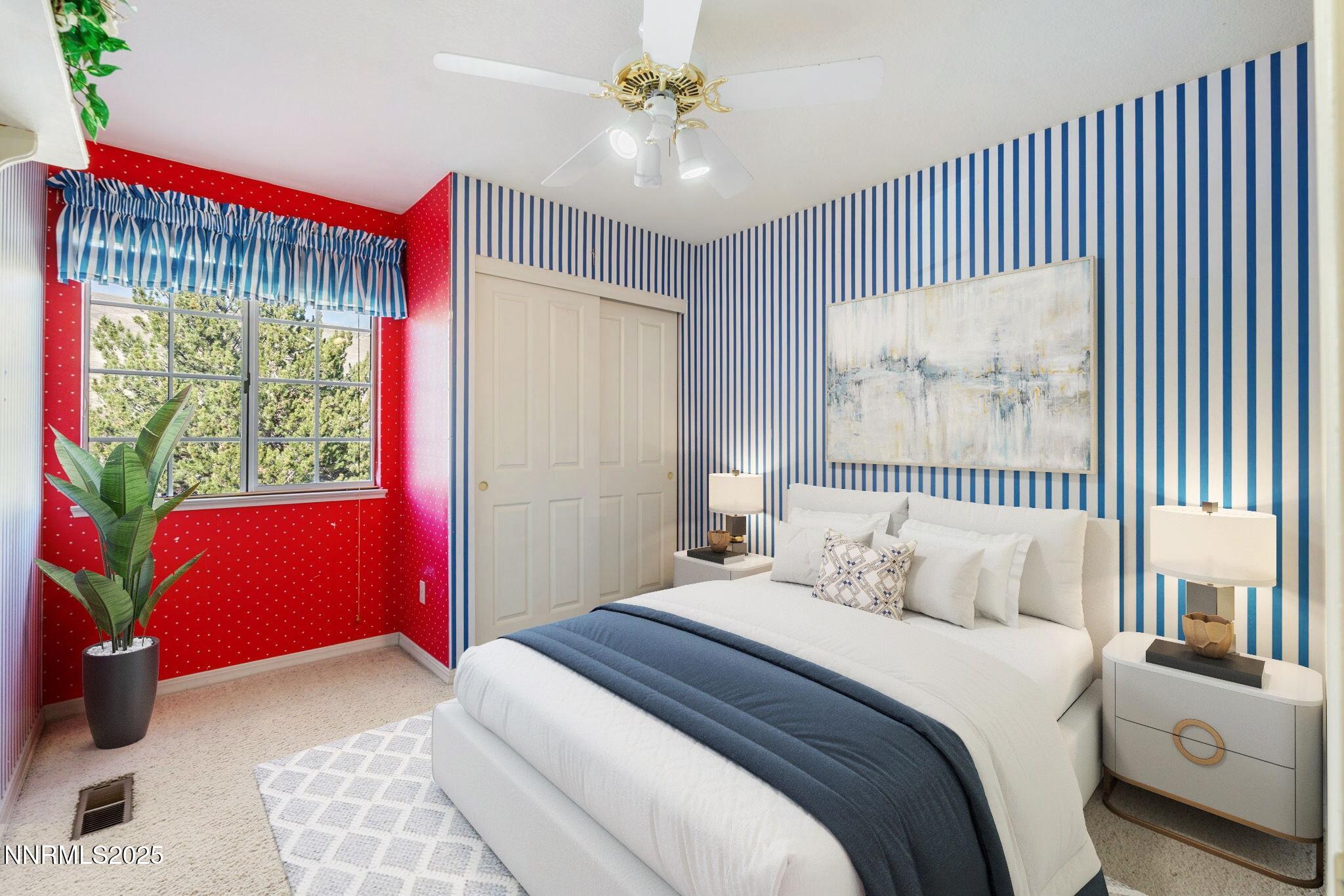 3952 Regal Drive Reno, NV 89503 - Photo 11 of 16 a bedroom with a bed and a painting on the wall