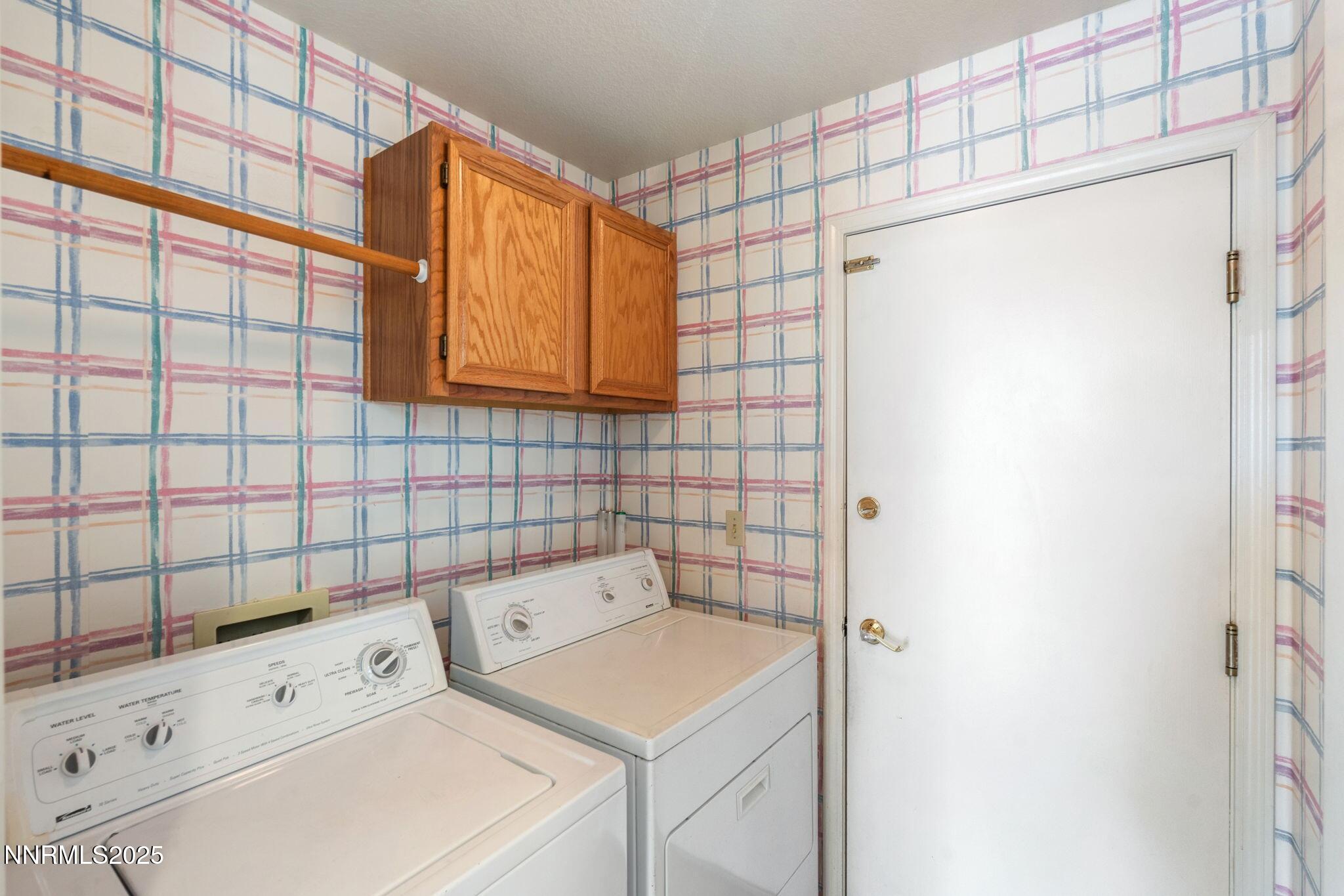 3952 Regal Drive Reno, NV 89503 - Photo 13 of 16 a utility room with dryer and washer
