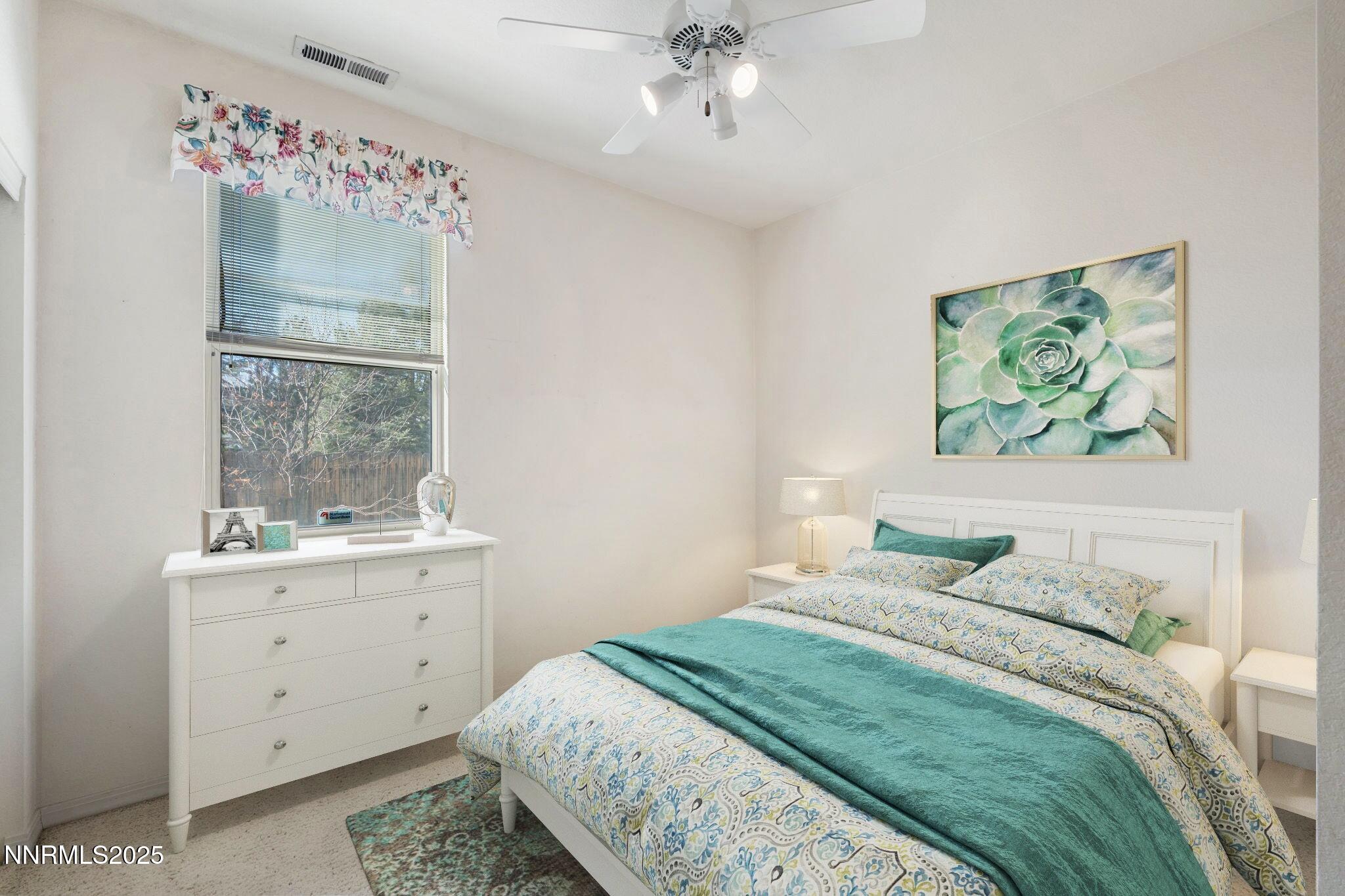 3952 Regal Drive Reno, NV 89503 - Photo 5 of 16 a bedroom with a bed and a window