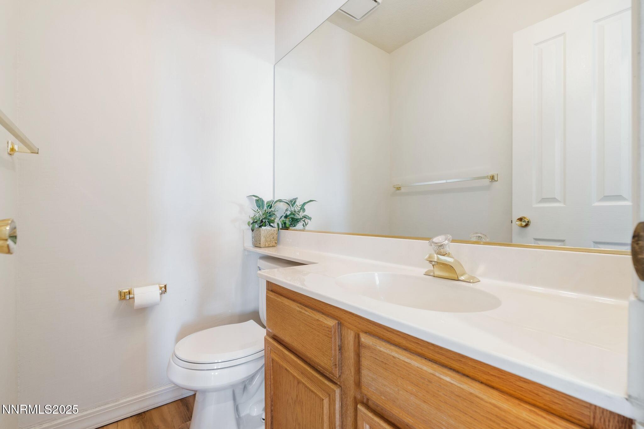 3952 Regal Drive Reno, NV 89503 - Photo 6 of 16 a bathroom with a sink and a toilet