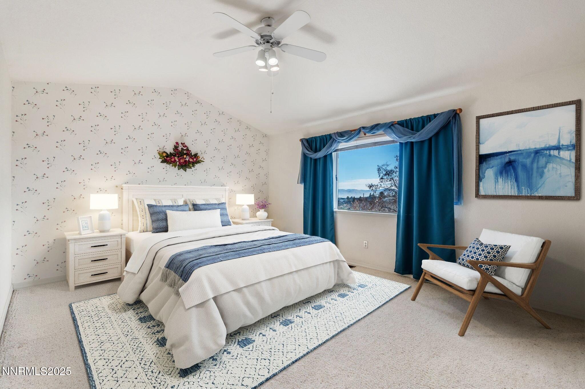 3952 Regal Drive Reno, NV 89503 - Photo 8 of 16 a bedroom with a bed and a chandelier