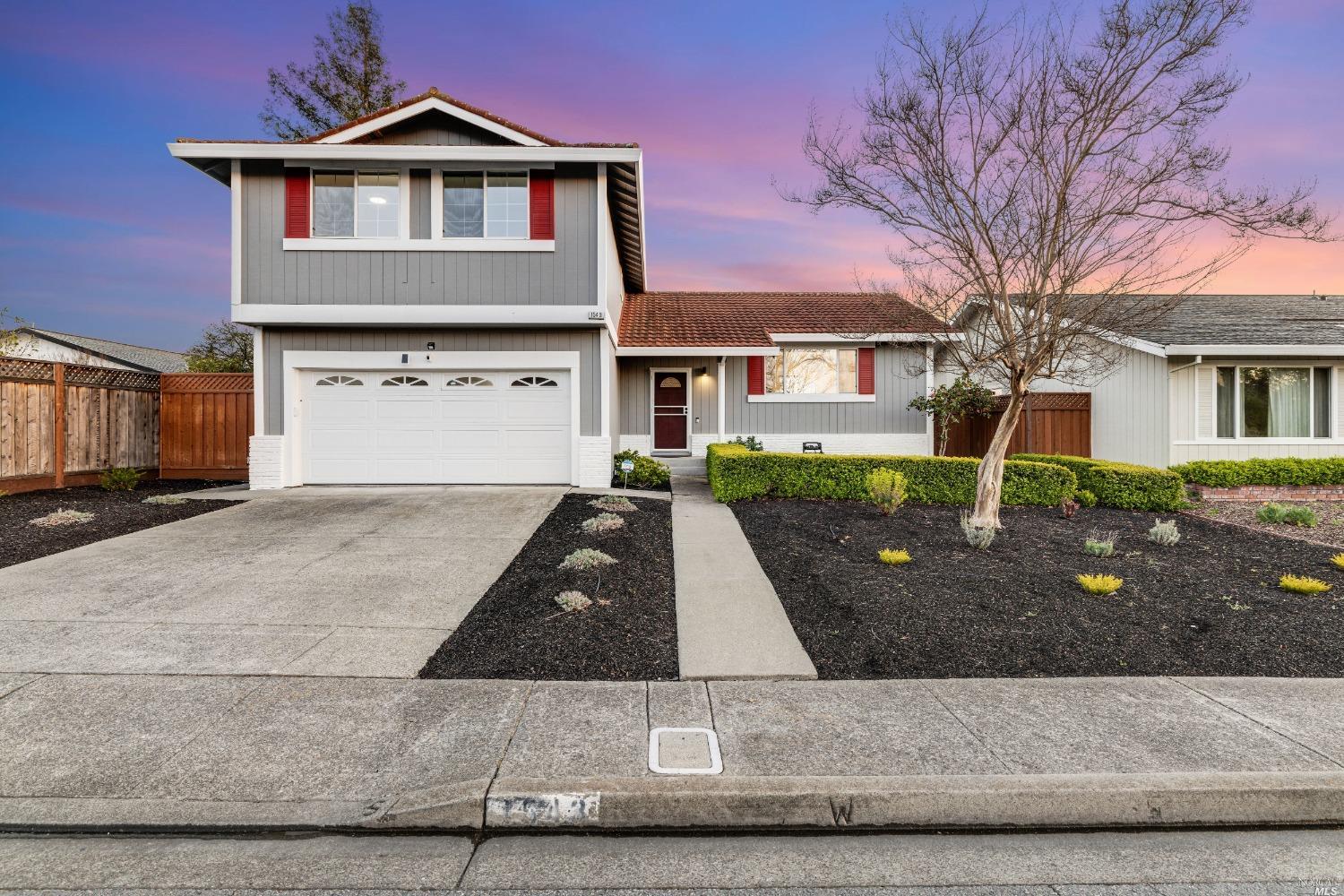 front view of a house with yard