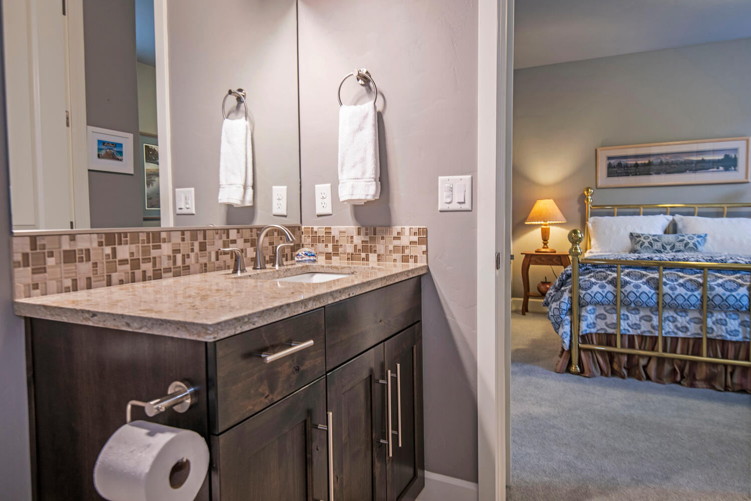 2630 Northwest Boulder Ridge Loop Bend, OR 97703 - Photo 23 of 31 Quartz countertops and tub/shower.