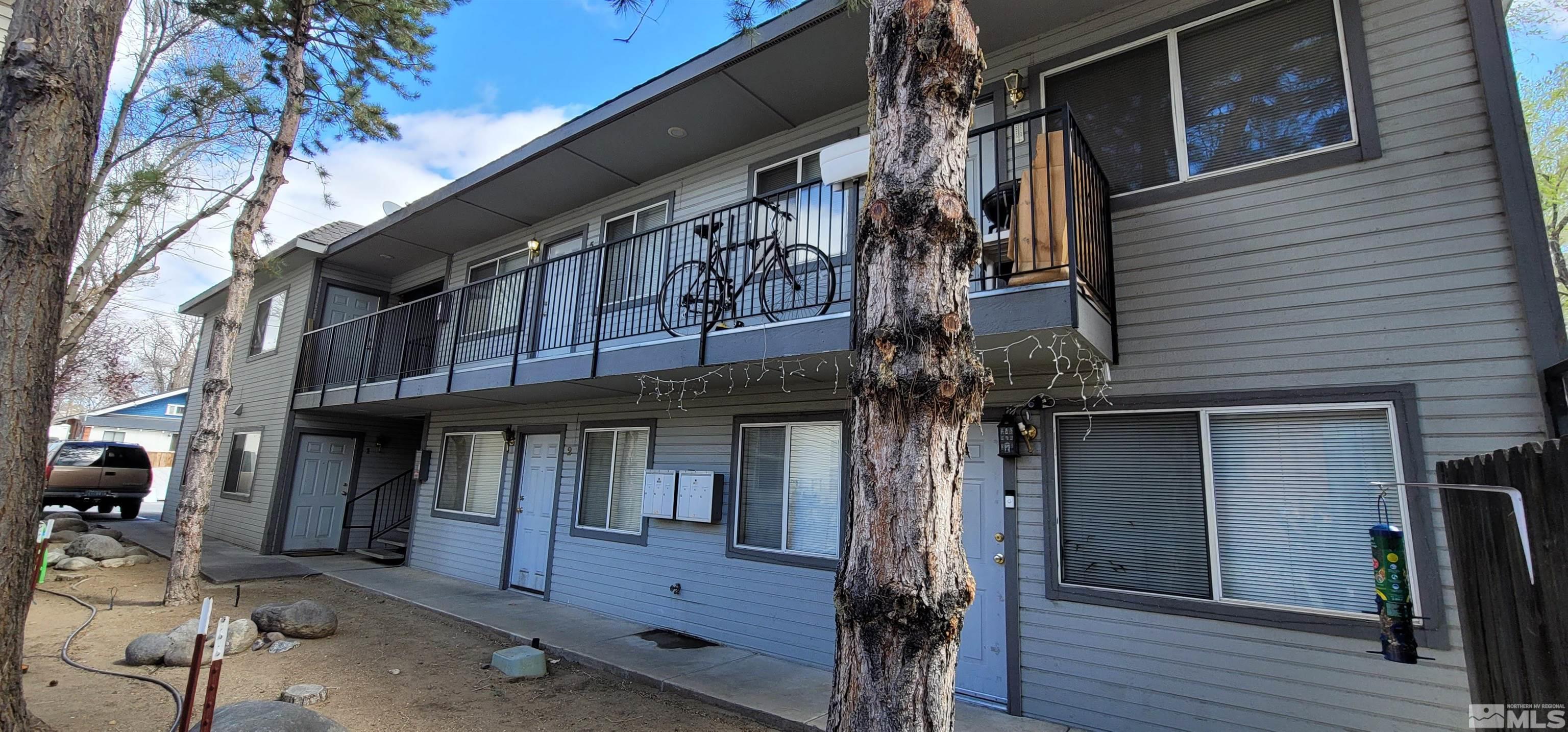 453 East 7th Street, Unit 16 Reno, NV 89512 - Photo 1 of 15 a view of a house with a door and wooden deck