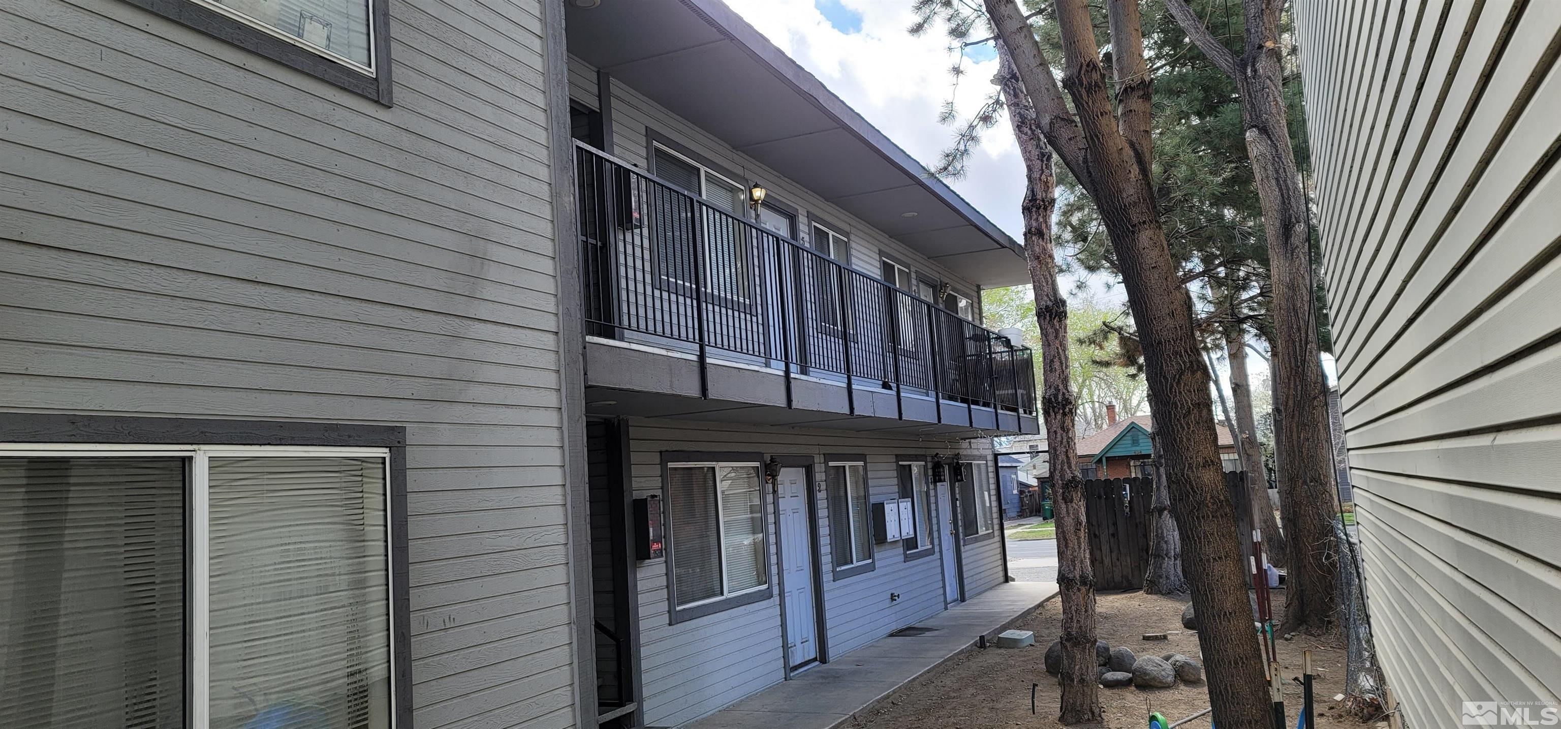 453 East 7th Street, Unit 16 Reno, NV 89512 - Photo 3 of 15 a view of wooden house with a large window