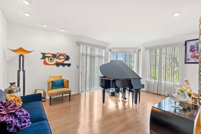 a kitchen with stainless steel appliances a sink a stove and a window