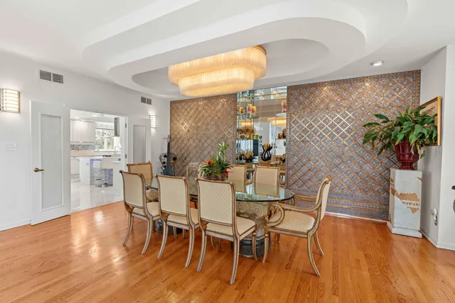 a view of a fireplace with entryway and front door
