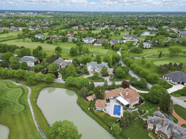 a view of living room with furniture and fireplace