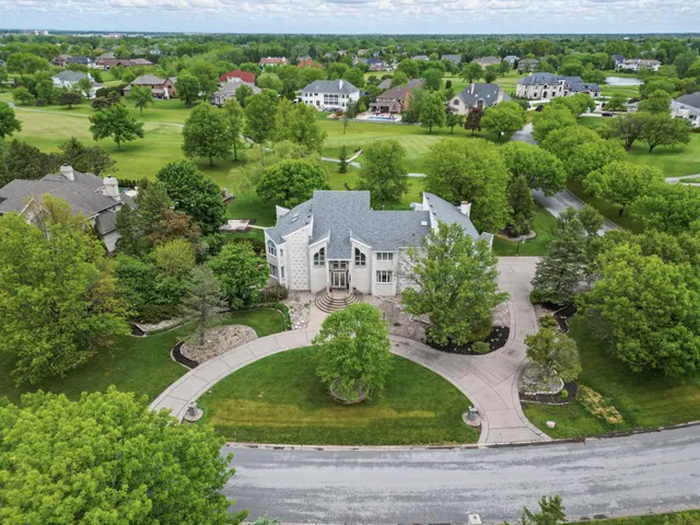 a view of a hallway with windows