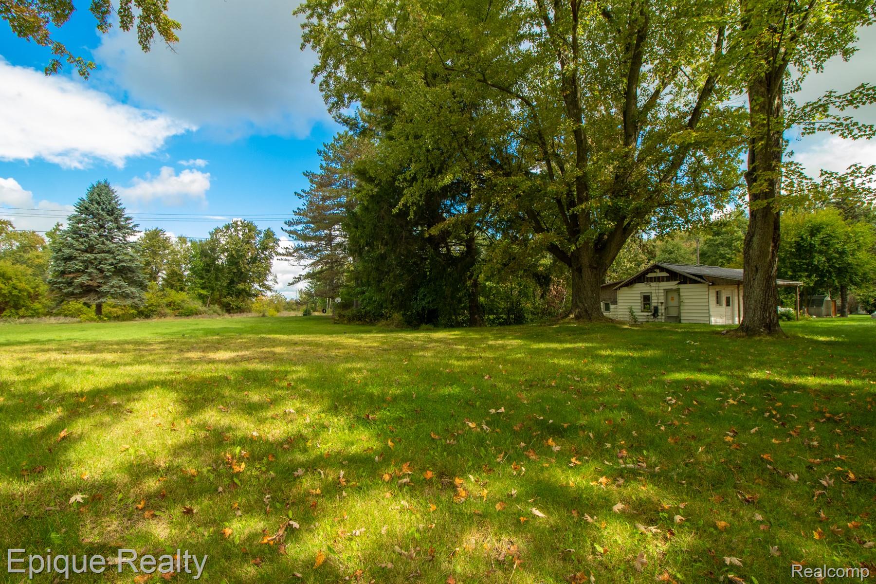 5831 Reed Street Deford, MI 48729 - Photo 4 of 11 View of grassy yard