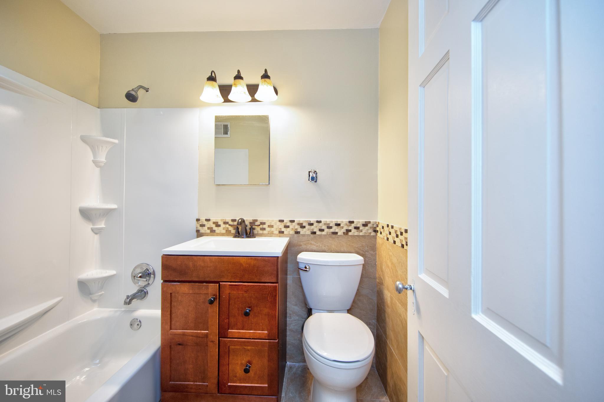 5907 Wakehurst Way Baltimore, MD 21239 - Photo 15 of 30 Remodeled master bathroom