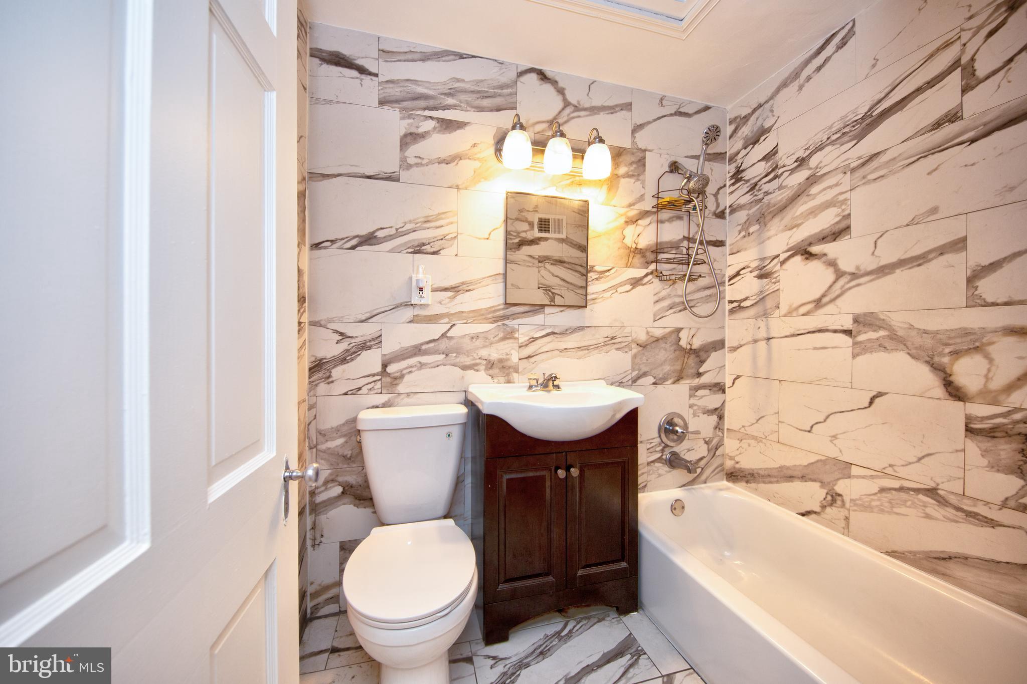 5907 Wakehurst Way Baltimore, MD 21239 - Photo 21 of 30 Full bathroom #2 on upper level