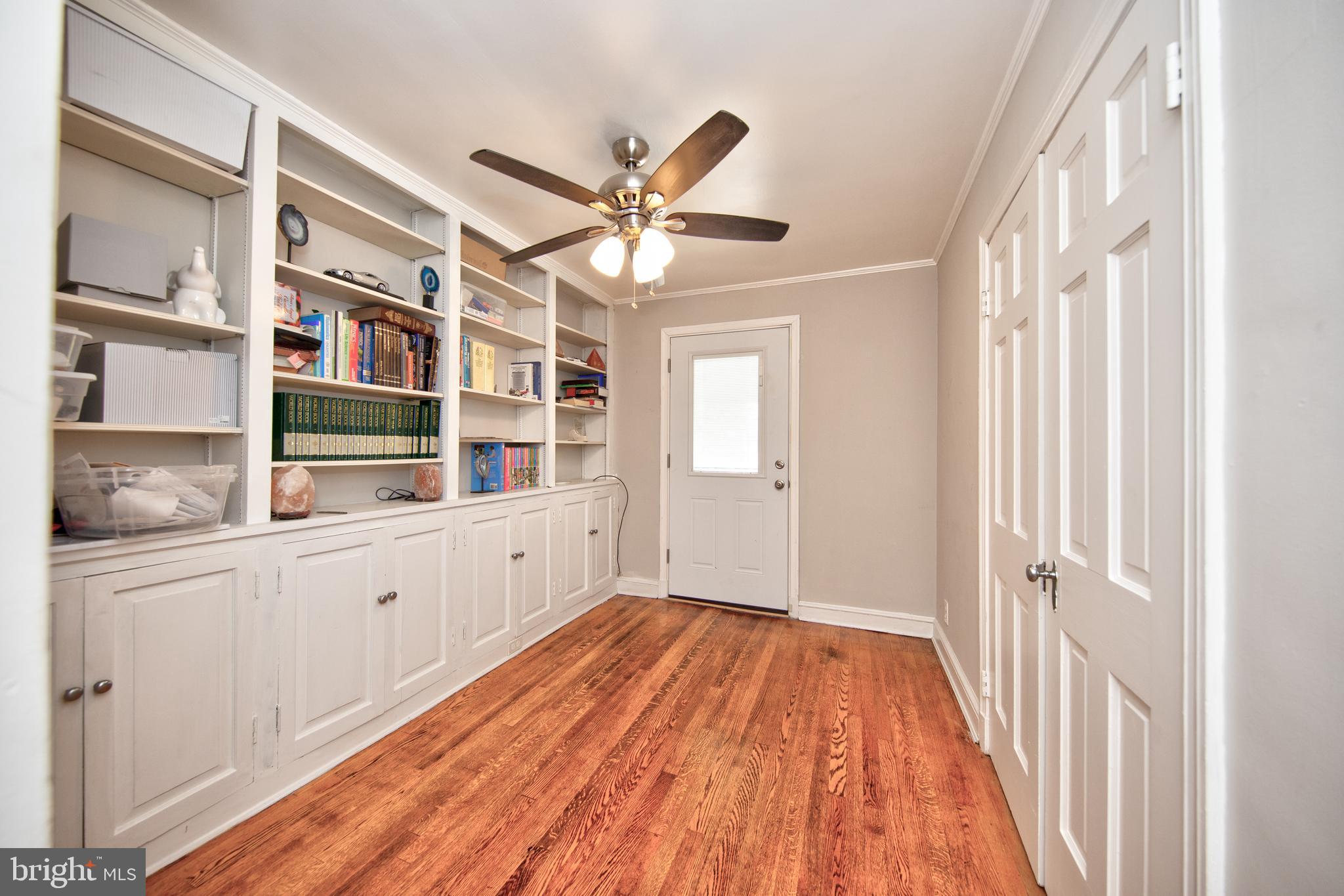 5907 Wakehurst Way Baltimore, MD 21239 - Photo 23 of 30 Bedroom #4 with custom built in shelves & cabinets