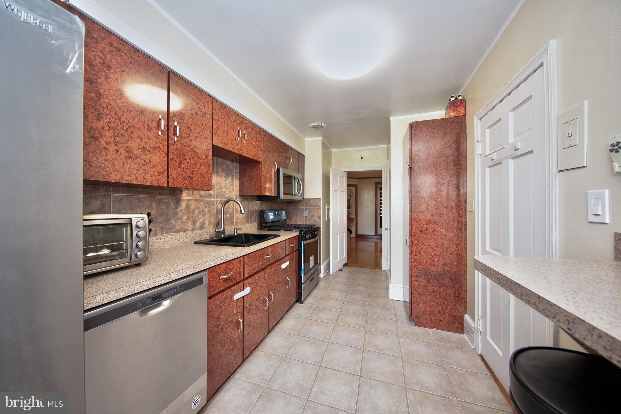 5907 Wakehurst Way Baltimore, MD 21239 - Photo 5 of 30 Brand new kitchen counters & cabinets