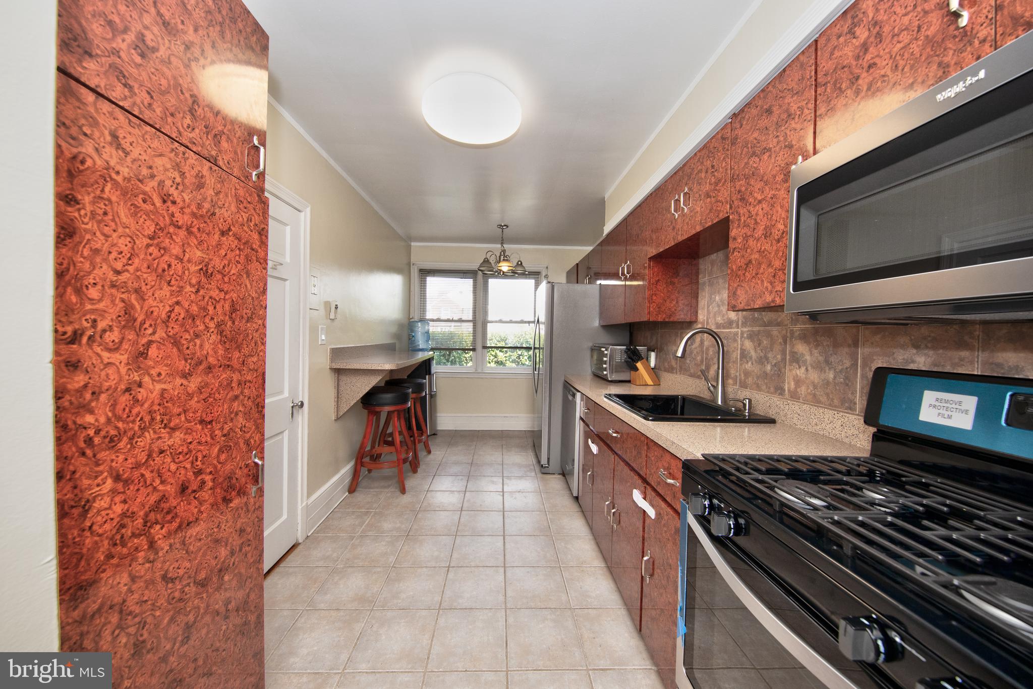 5907 Wakehurst Way Baltimore, MD 21239 - Photo 6 of 30 Kitchen with large pantry