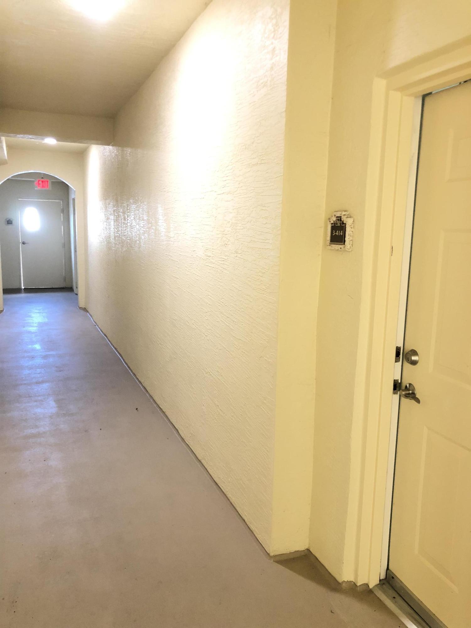 3414 Renaissance Way, Unit 414 Boynton Beach, FL 33426 - Photo 7 of 17 Front Door and Access to Parking at End