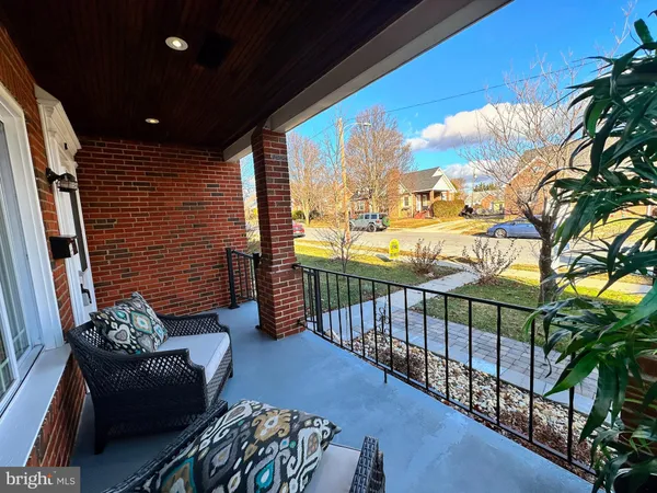 a balcony with furniture
