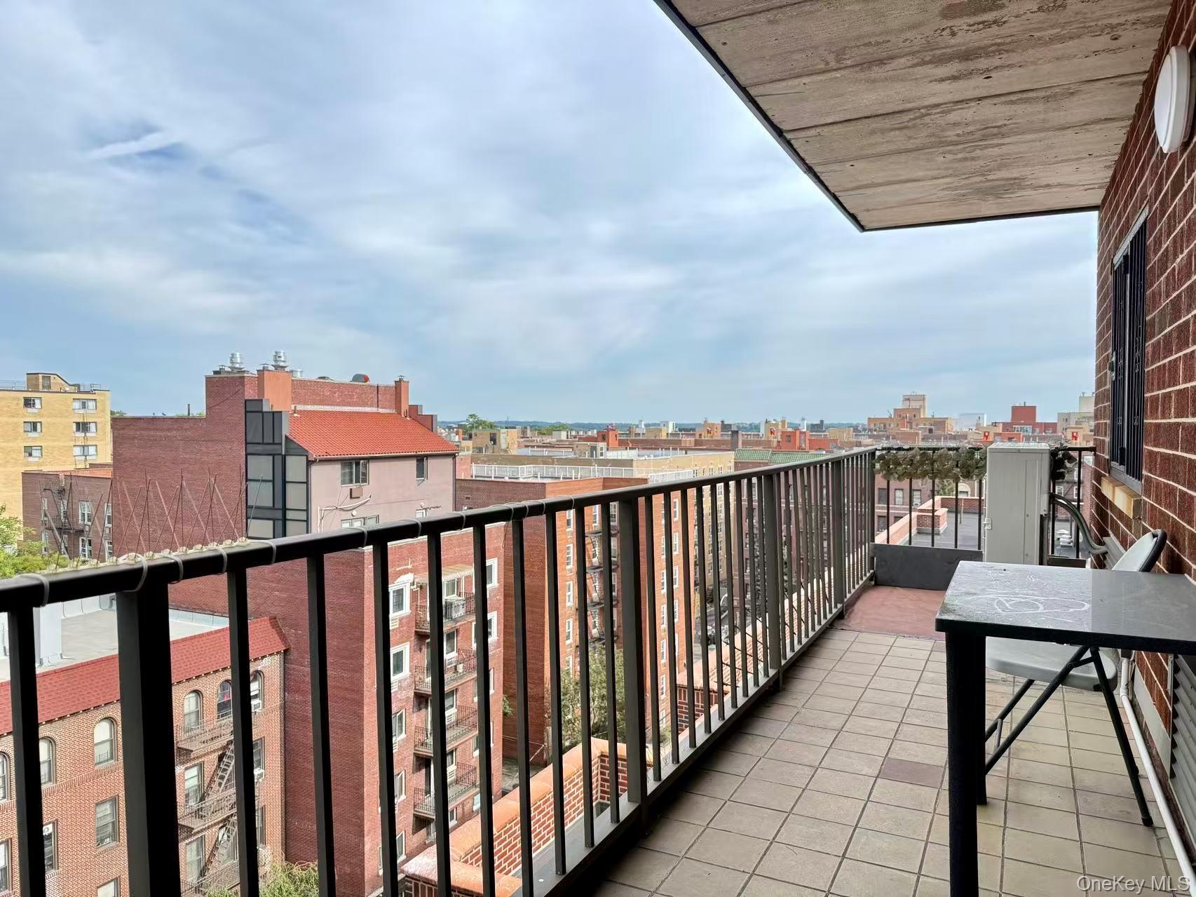 42-42 Union Street, Unit 9PHC Queens, NY 11355 - Photo 14 of 21 a balcony with city view