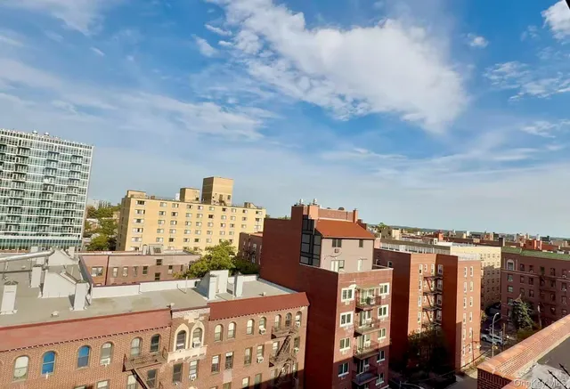 a view of a building with potted plants