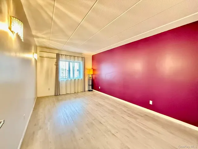 a kitchen with a refrigerator and a stove