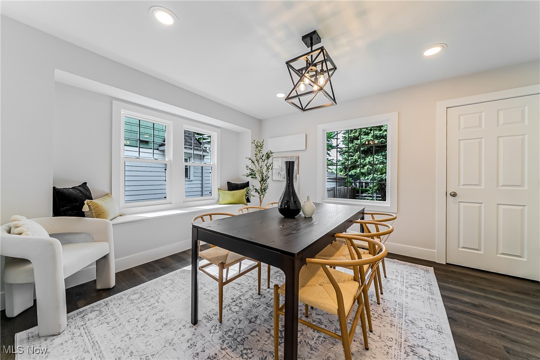 3817 Summit Park Road Cleveland Heights, OH 44121 - Photo 9 of 29 Dining room with plenty of natural light, dark wood-look flooring, recessed lighting, and a chandelier