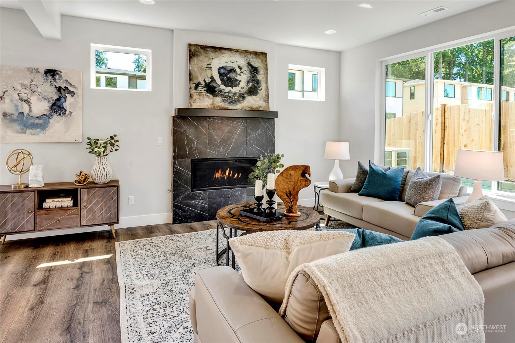 20 216th Street Southwest Bothell, WA 98021 - Photo 11 of 39 a living room with furniture and a fireplace