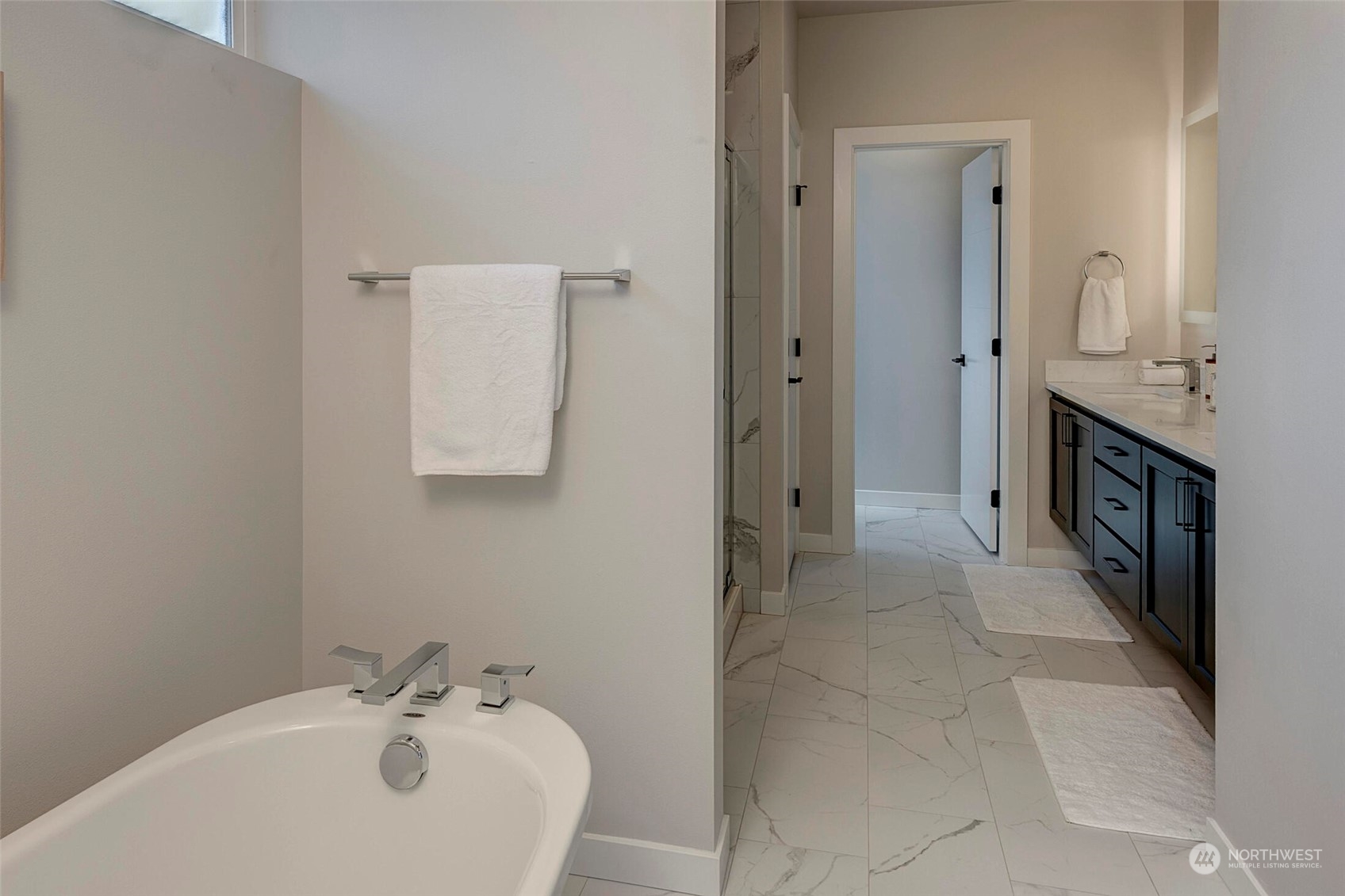 20 216th Street Southwest Bothell, WA 98021 - Photo 28 of 39 a spacious bathroom with a sink and a mirror