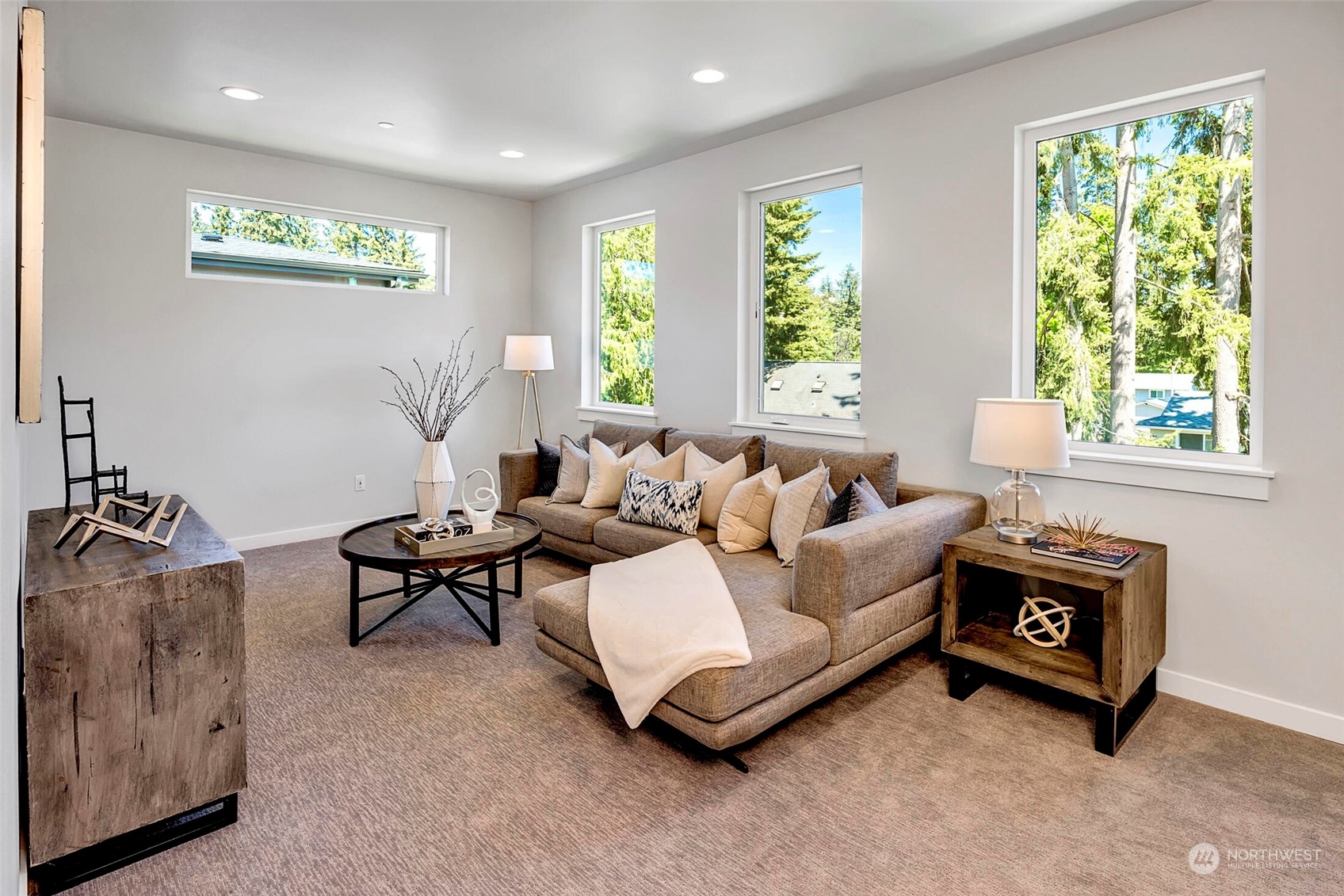 20 216th Street Southwest Bothell, WA 98021 - Photo 31 of 39 a living room with furniture and a large window
