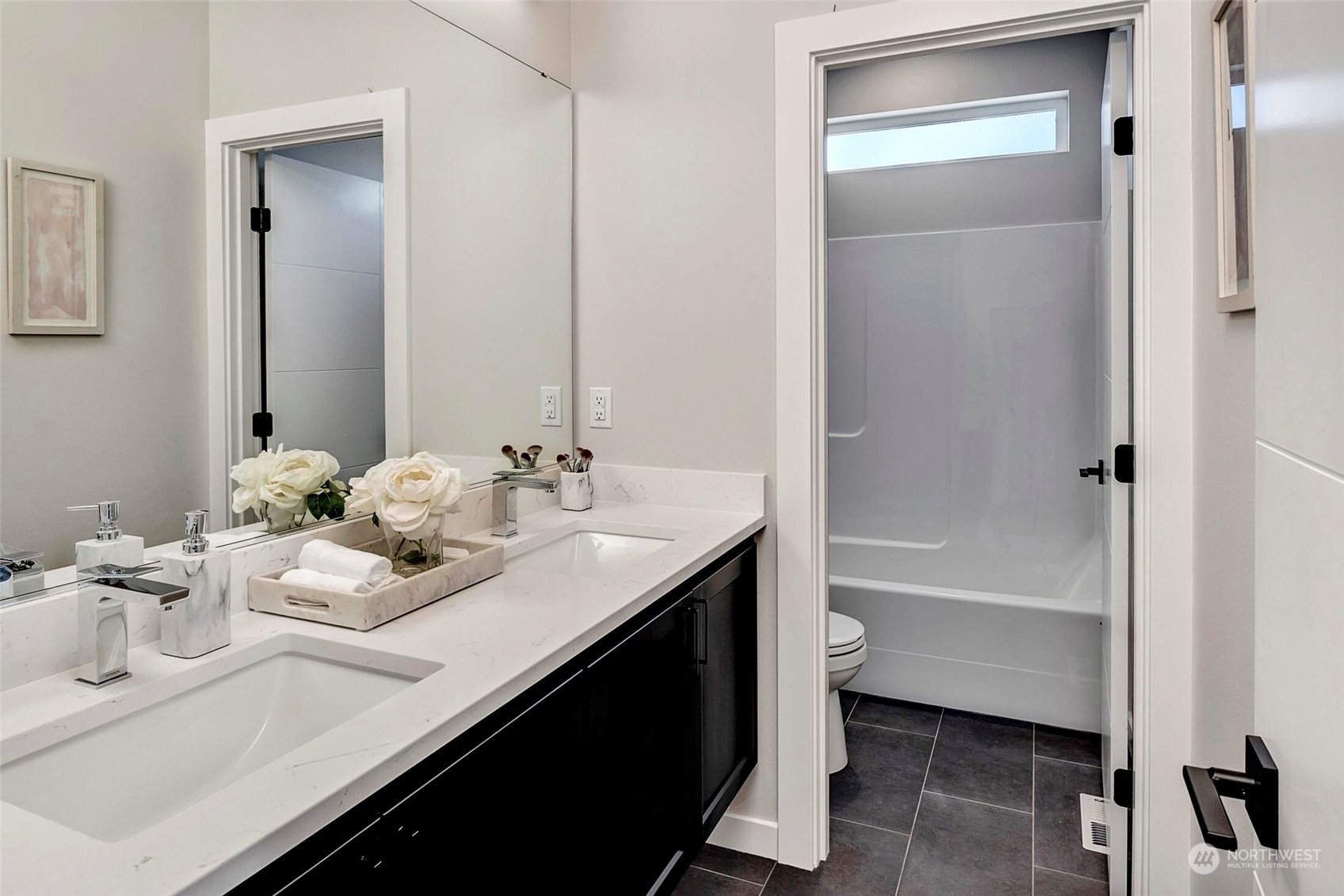 20 216th Street Southwest Bothell, WA 98021 - Photo 36 of 39 a bathroom with a sink a toilet and a bathtub