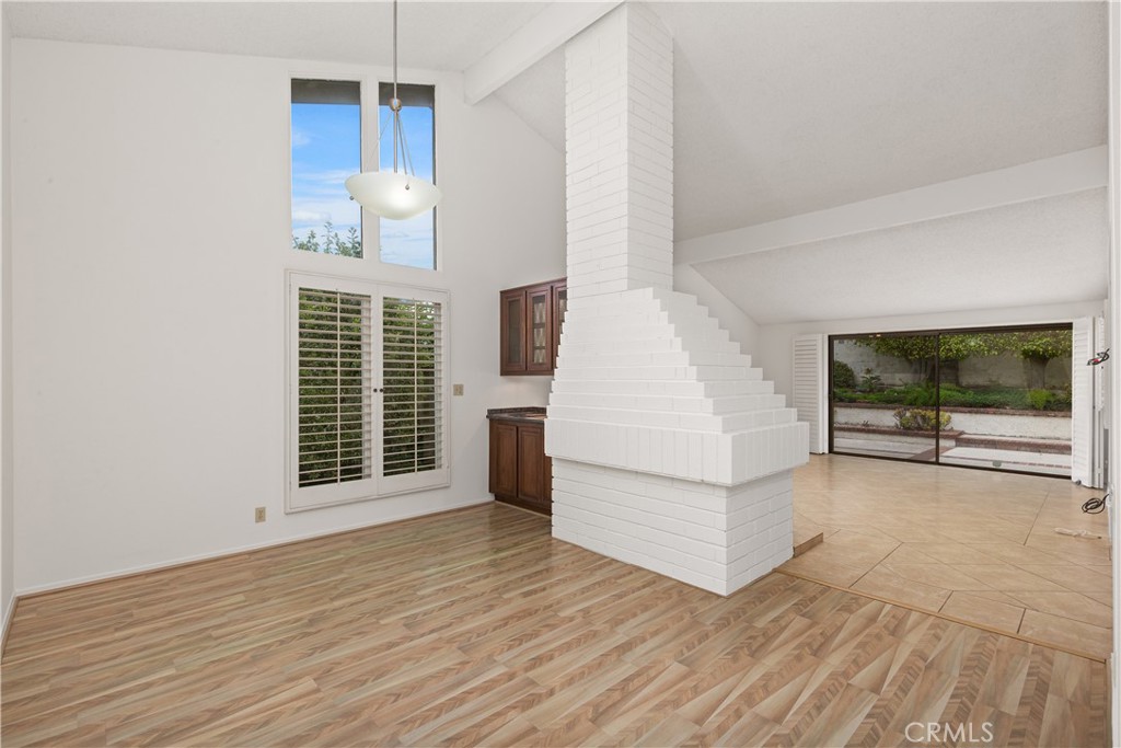 37 Beachcomber Drive Corona del Mar, CA 92625 - Photo 12 of 39 a view of empty room with wooden floor and fan