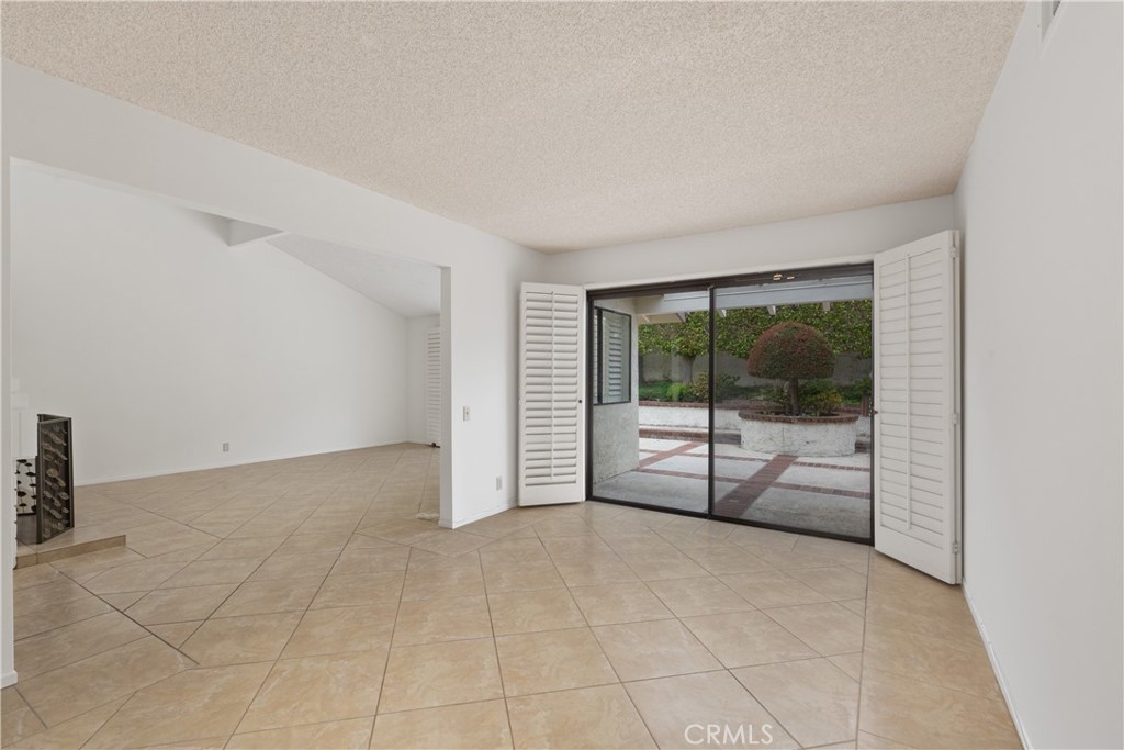37 Beachcomber Drive Corona del Mar, CA 92625 - Photo 22 of 39 a view of an empty room and window