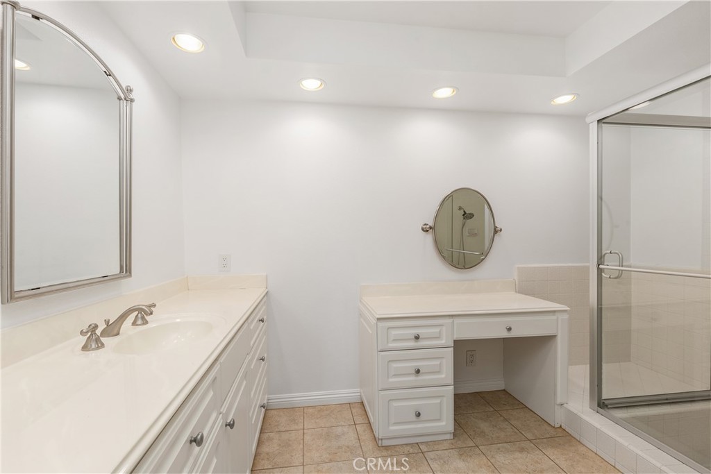 37 Beachcomber Drive Corona del Mar, CA 92625 - Photo 28 of 39 a bathroom with a sink vanity and a mirror