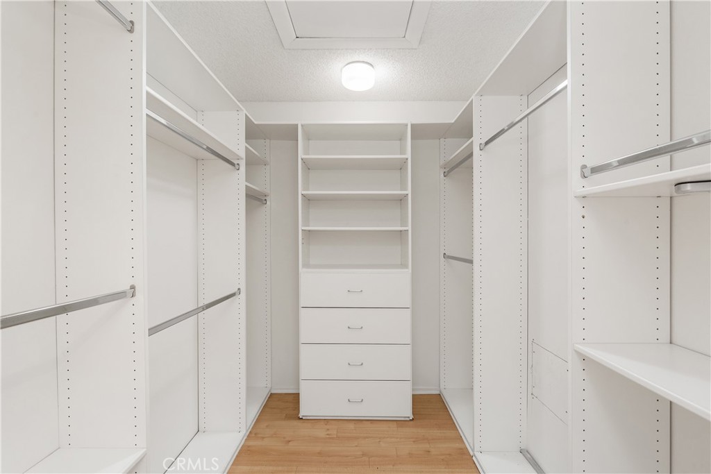 37 Beachcomber Drive Corona del Mar, CA 92625 - Photo 30 of 39 a view of walk in closet with empty racks