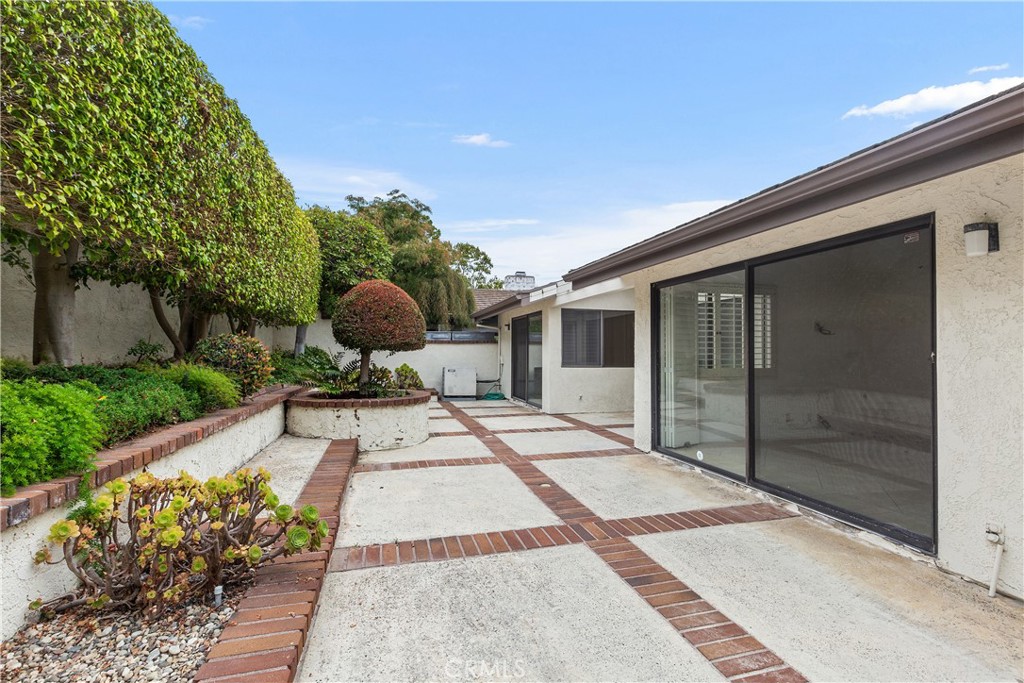 37 Beachcomber Drive Corona del Mar, CA 92625 - Photo 34 of 39 a view of a backyard with sitting area and garden