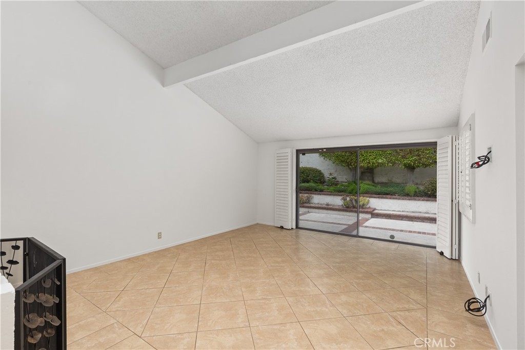 37 Beachcomber Drive Corona del Mar, CA 92625 - Photo 7 of 39 an empty room with large window