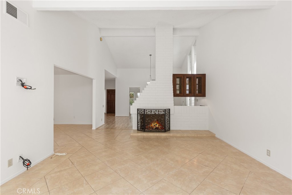37 Beachcomber Drive Corona del Mar, CA 92625 - Photo 10 of 39 a view of a livingroom with fireplace