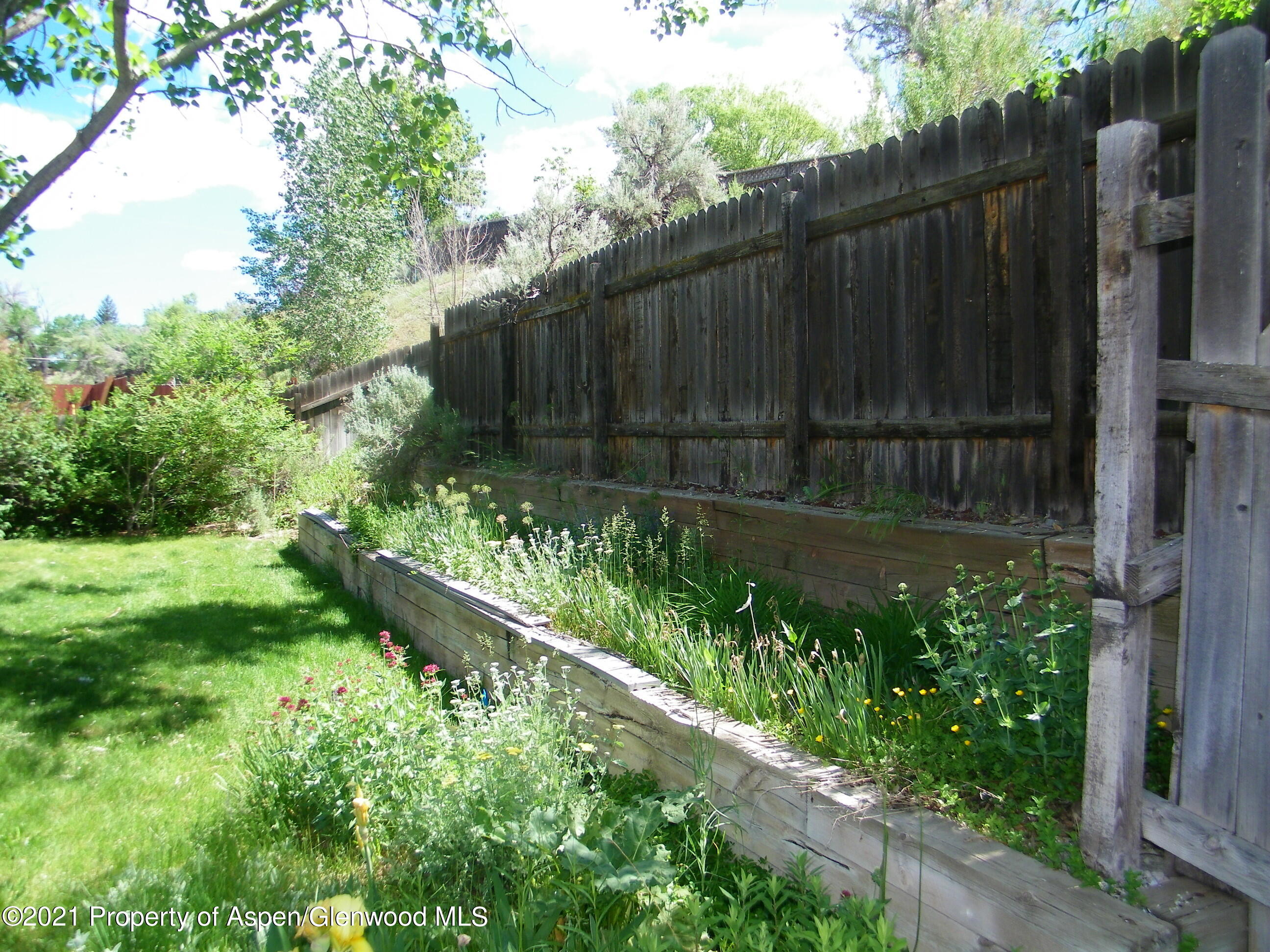 680 Moki Avenue Rifle, CO 81650 - Photo 36 of 39 a view of garden with wooden fence